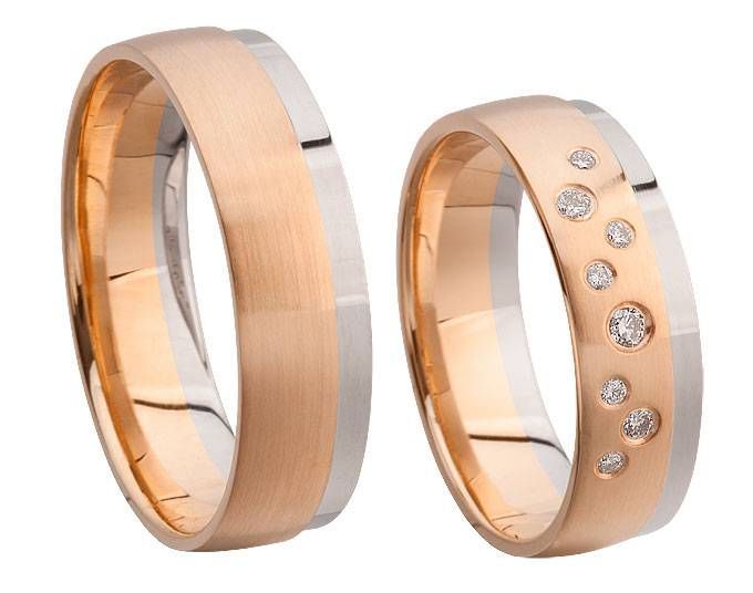 Zwei Armreifen kupfer- und silberfarben