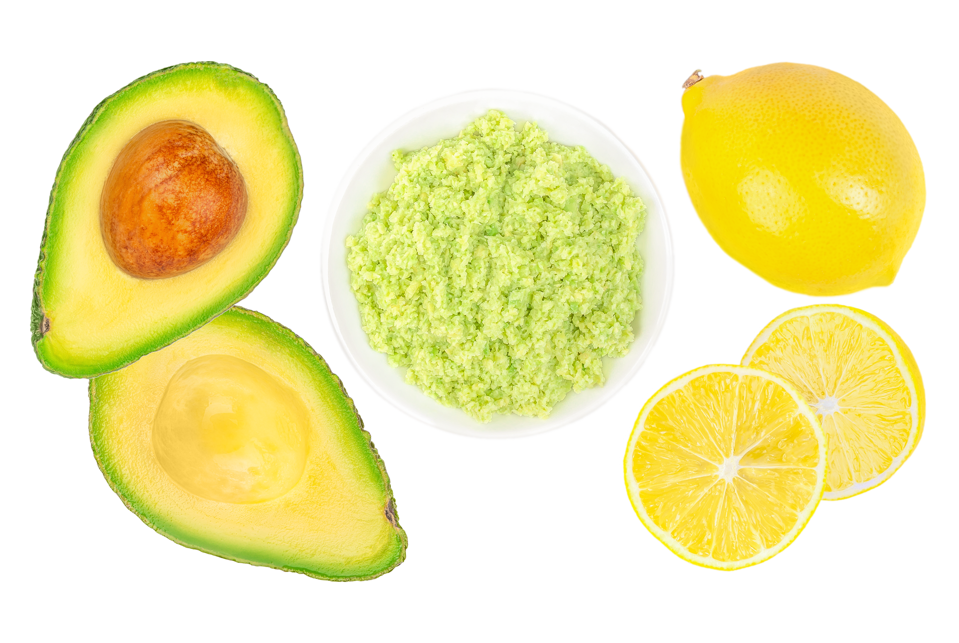 Bol de guacamole avec avocats et citrons jaunes de part et d'autre
