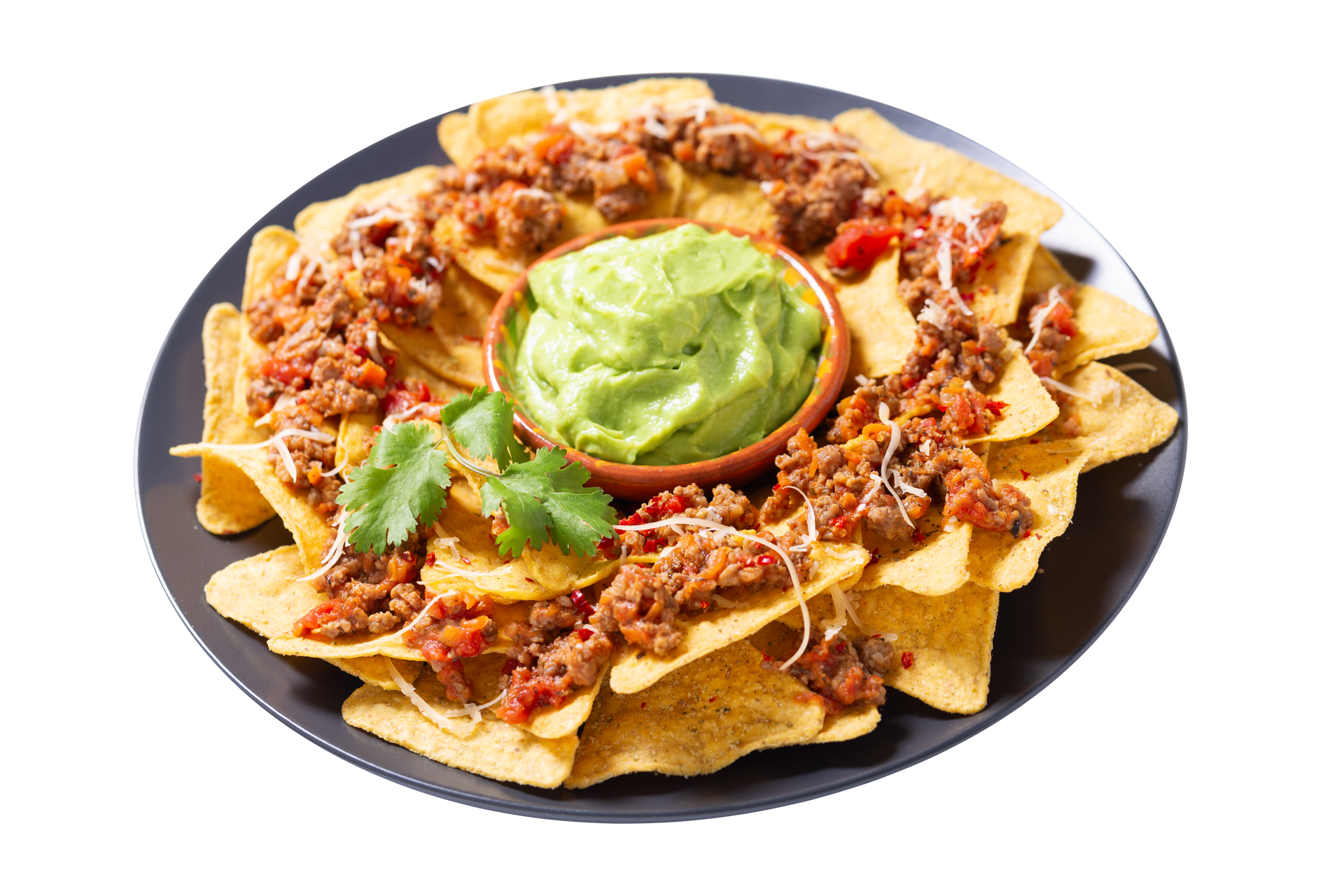Assiette de nachos avec viande hachée et bol de guacamole