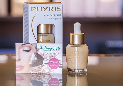 Eine Flasche Phyris Beauty Dream Foundation neben einer Schachtel