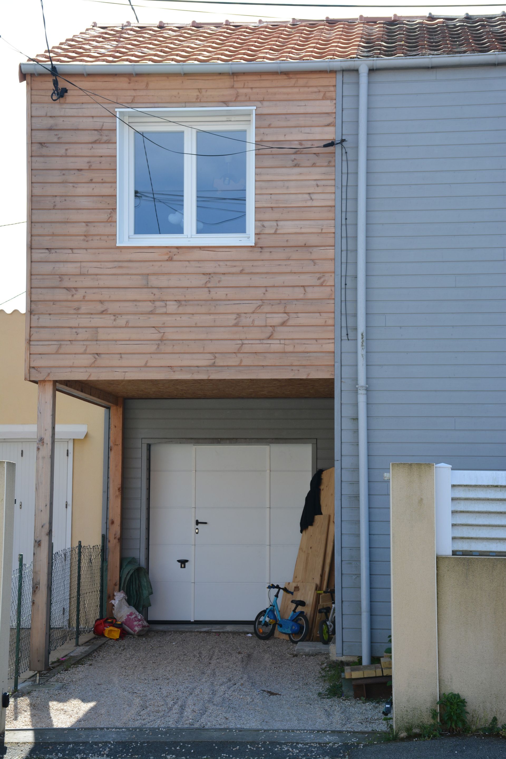 Extension de maison avec bardage en bois