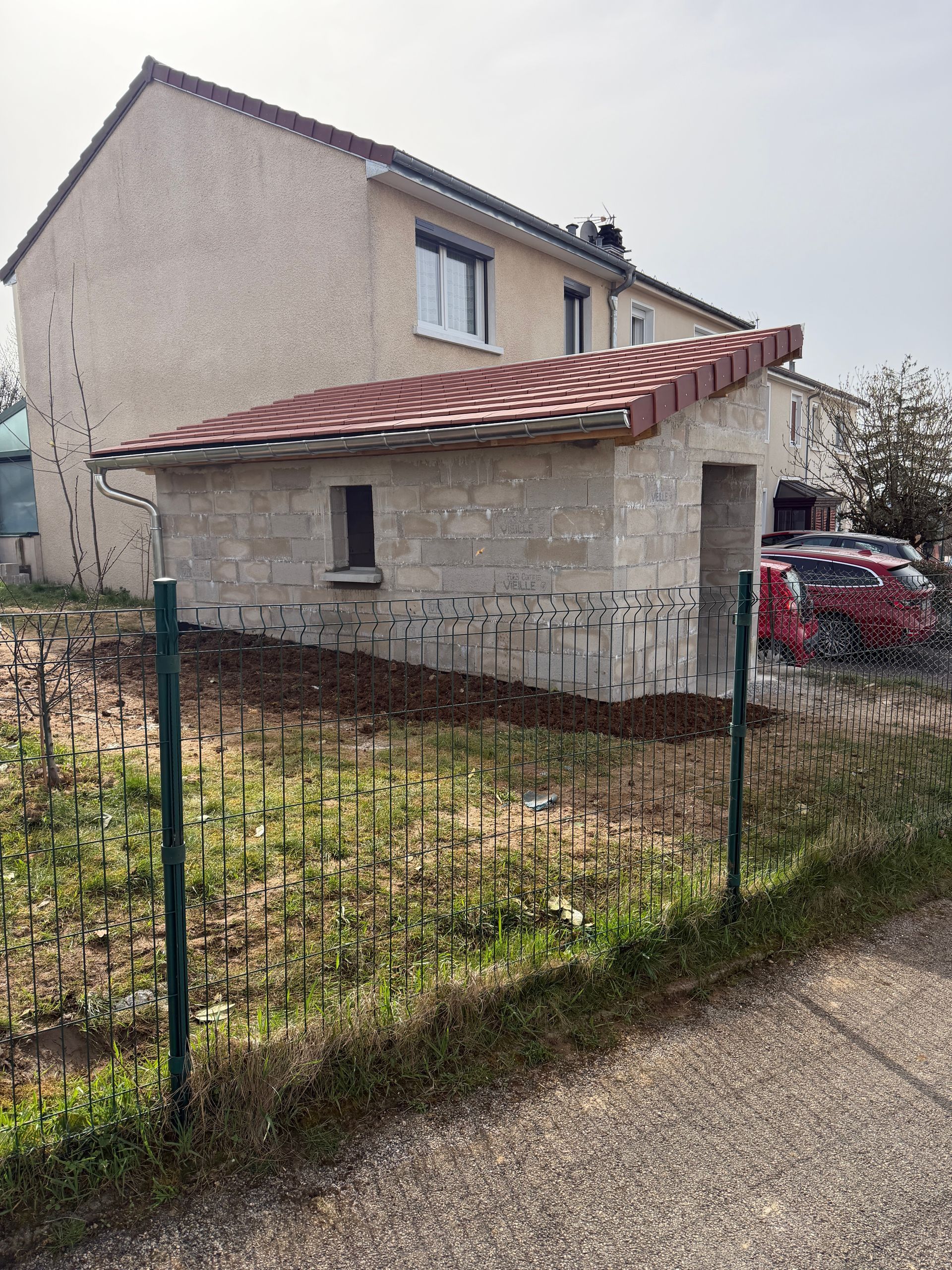 Extension de maison avec bardage en bois