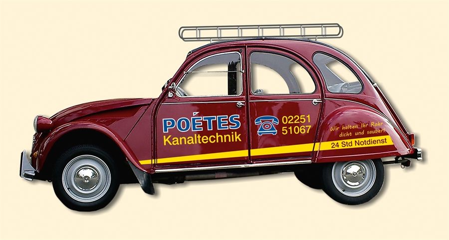 Ein rotes Auto mit dem Wort Poetes darauf