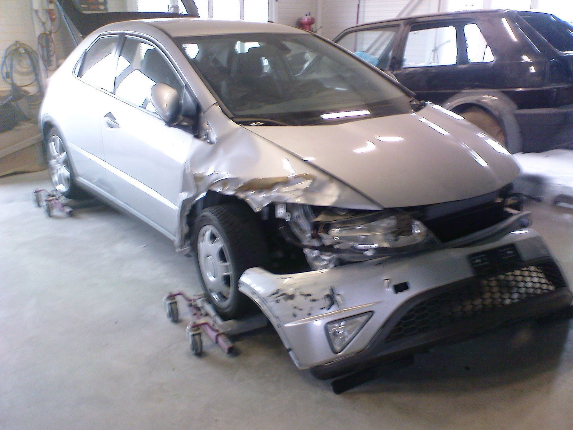 Volgger Carrosserie und Spritzwerk - Honda Civic Carrosserie Instandstellen