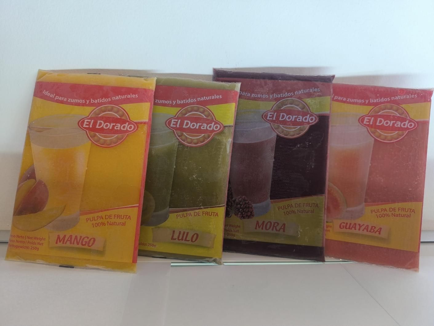 Four colorful El Dorado drink mix packets: mango, lulo, mora, and guayaba.