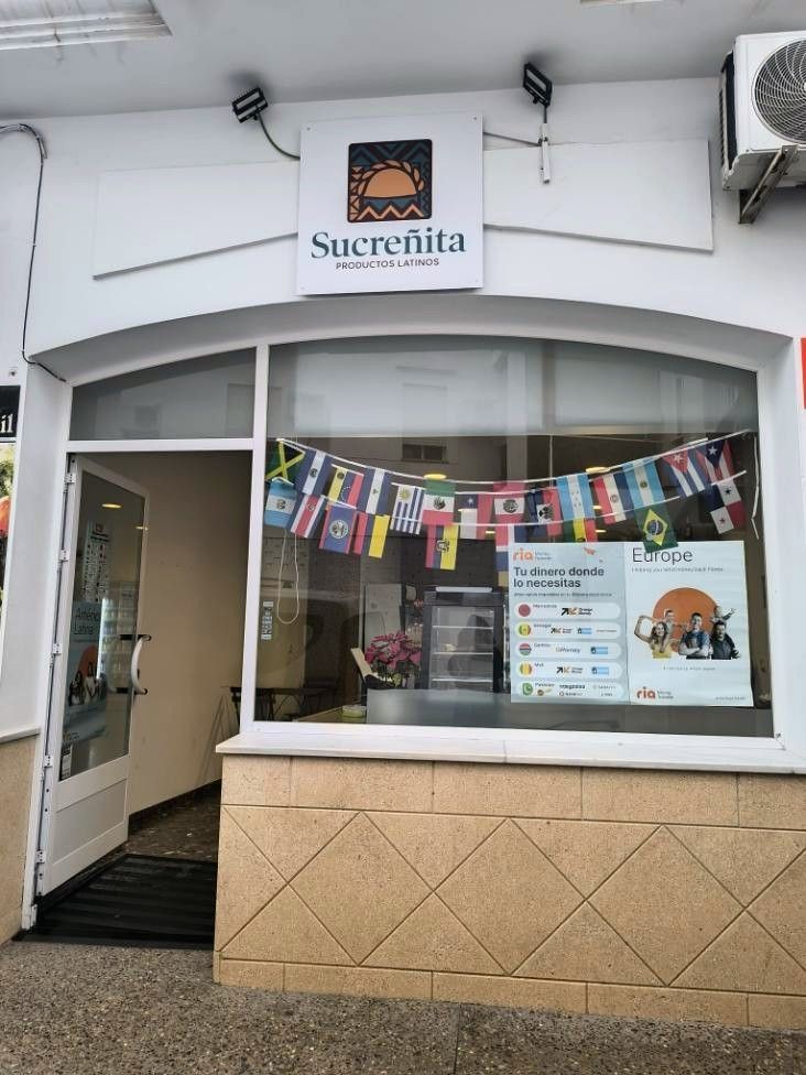 Fachada de tienda con cartel de 