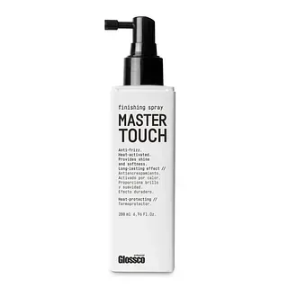 Una botella de spray de acabado Master Touch sobre un fondo blanco.