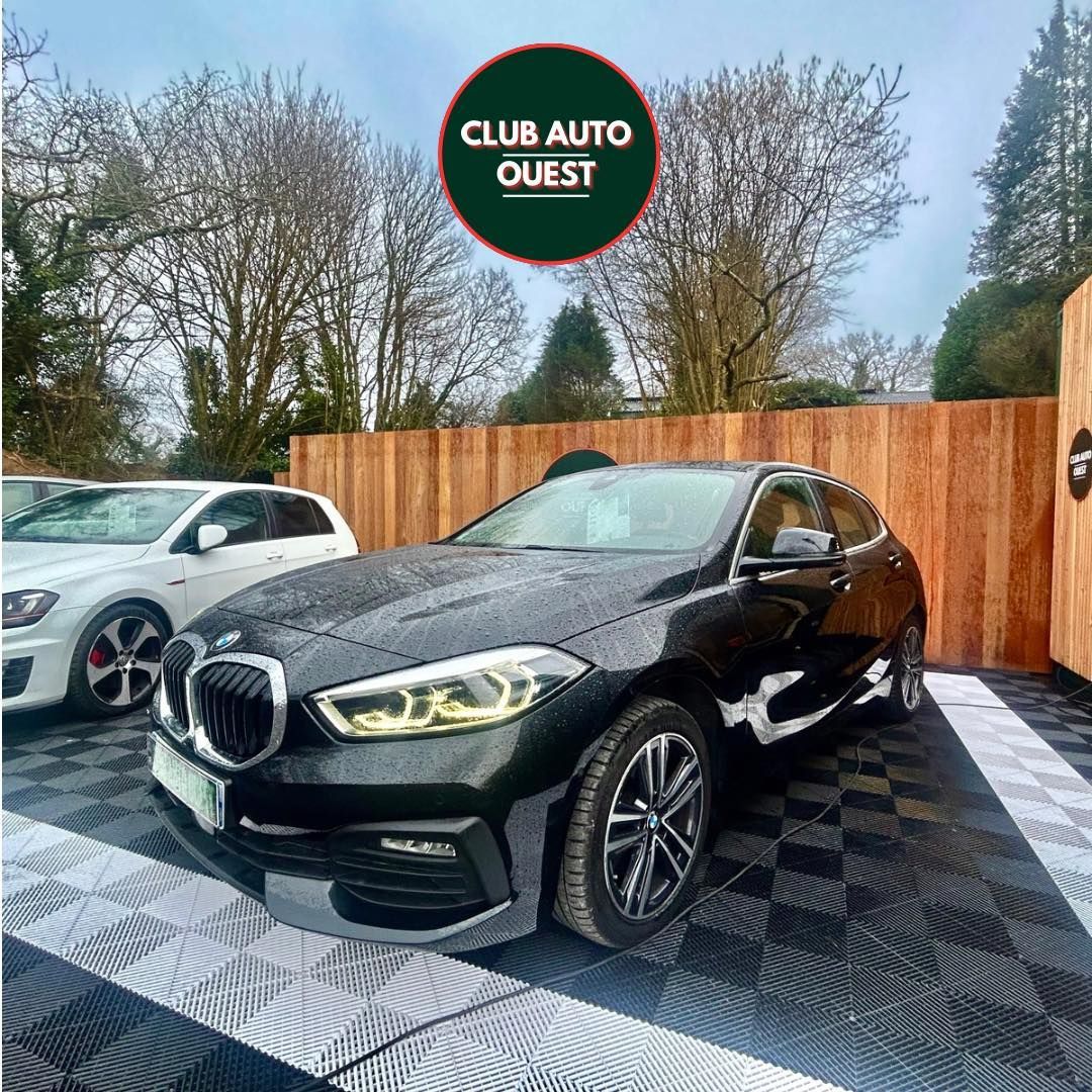 Berline BMW noire 5 portes
