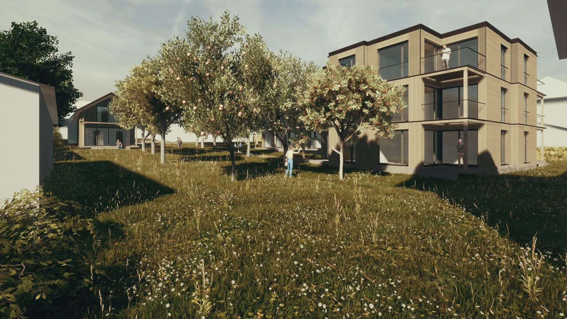 Ein modernes dreistöckiges Gebäude und ein kleineres Haus in einem üppigen, grünen Garten mit mehreren alten Bäumen.