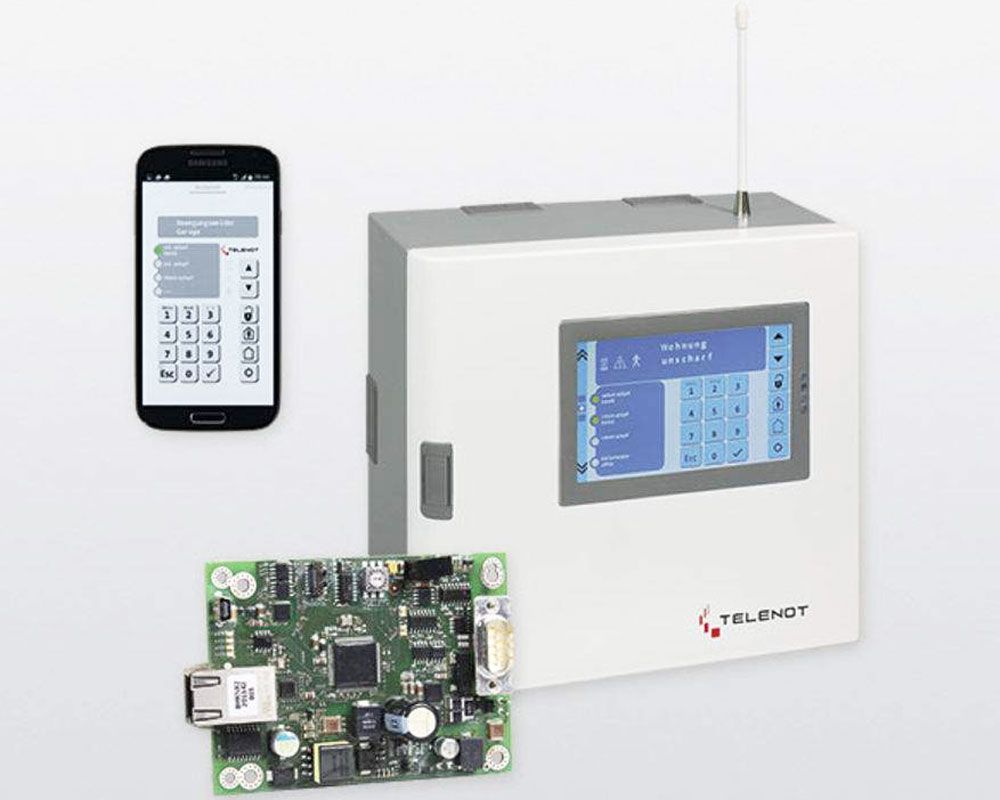 Ein weißes Sicherheitssystem mit einem Touchscreen-Display.