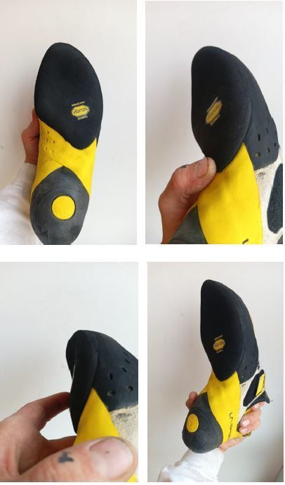 Una persona sostiene un par de zapatos de escalada amarillos y negros.