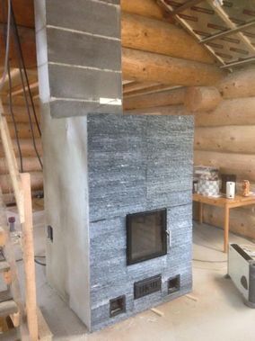 yksilöllinen käsinmuurattu takka