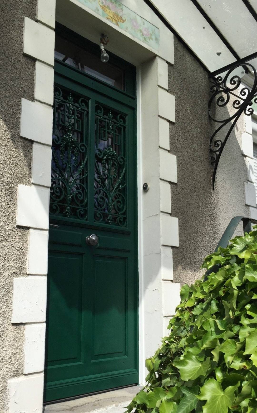 Porte vitrée verte style ancien