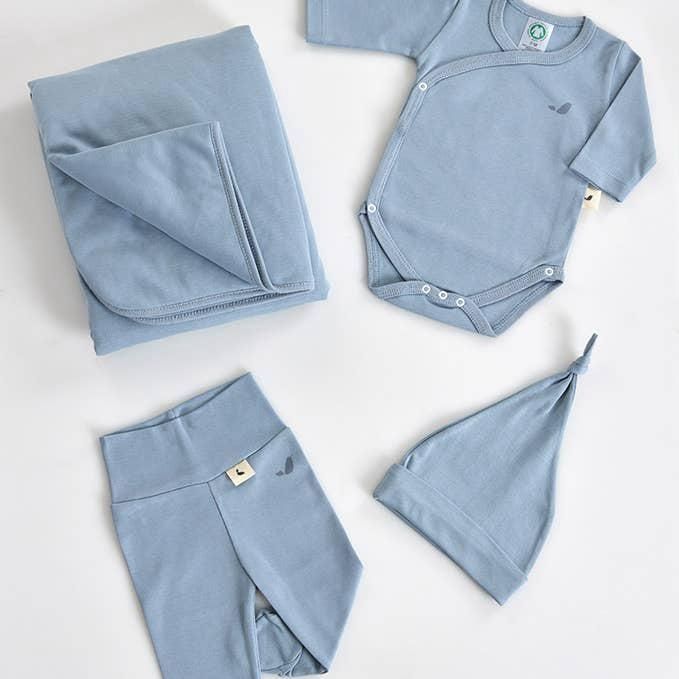 Set de 4 sous-vêtements de bébé bleus.