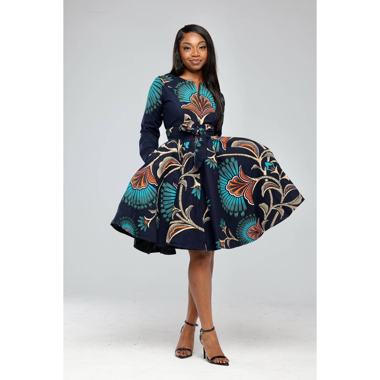 Robe courte à manches longues en wax.