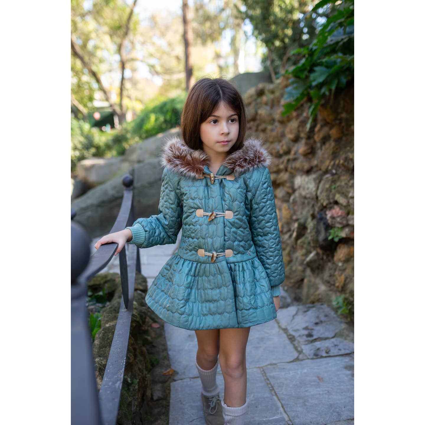 Doudoune de fille bleue.