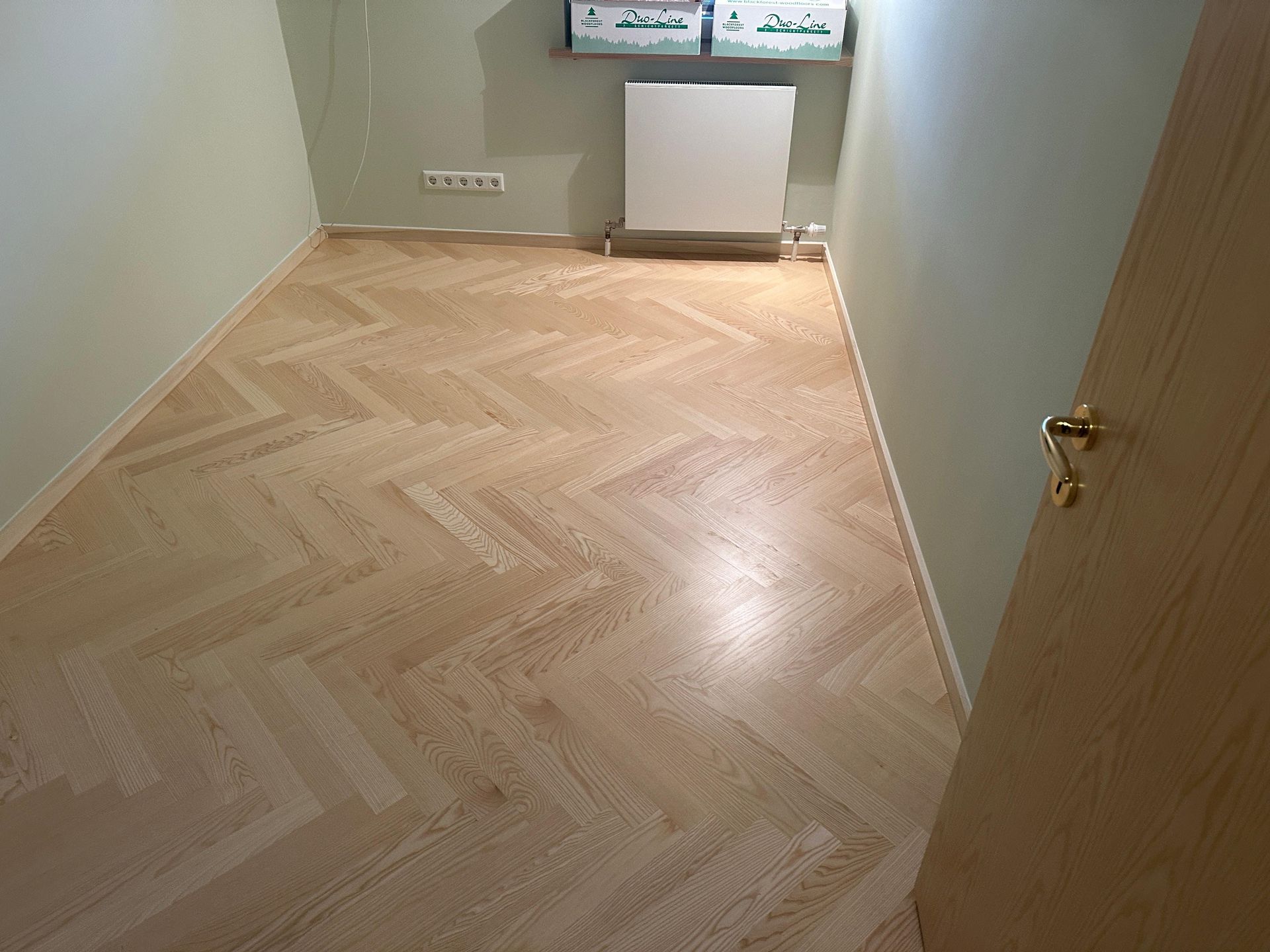 Zimmer in Fischgratparkettverlegung