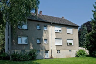 Zimmerei Zultner GmbH & CO. KG - Mehrfamilienhaus mit grauen Wänden