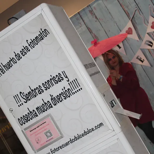 A photo booth has a sign that says 