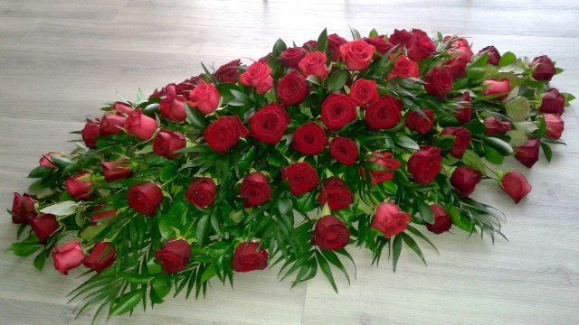 Aldo Perruchoud Sàrl - Arrangement de roses rouges