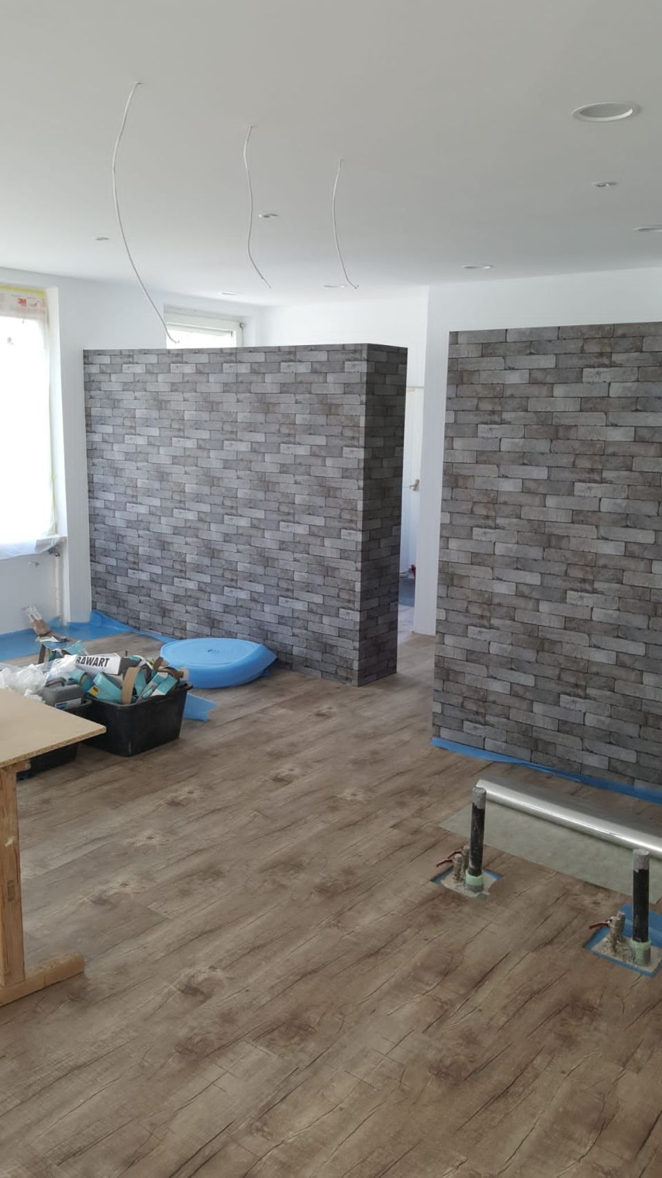 Wandgestaltung in Steinoptik durch Sunshine Maler