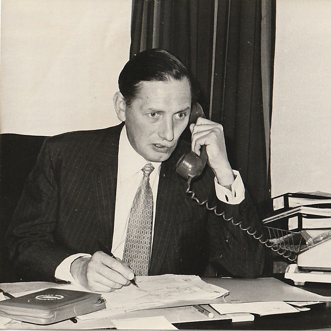 Frederick Smith on the telephone