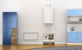 Interior de baño con ducha azul, calentador de agua, radiador y gabinetes azules contra una pared blanca.