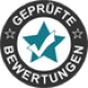 Rundes Abzeichen mit der Aufschrift „GEPRÜFTE BEWERTUNGEN“ und einem türkisfarbenen Häkchenstern in der Mitte.