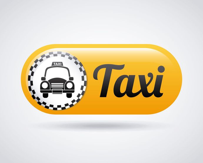 Un primer plano de un cartel de taxi en el techo de un automóvil.