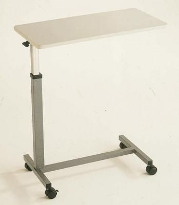 Una mesa blanca con ruedas está colocada sobre una superficie blanca.