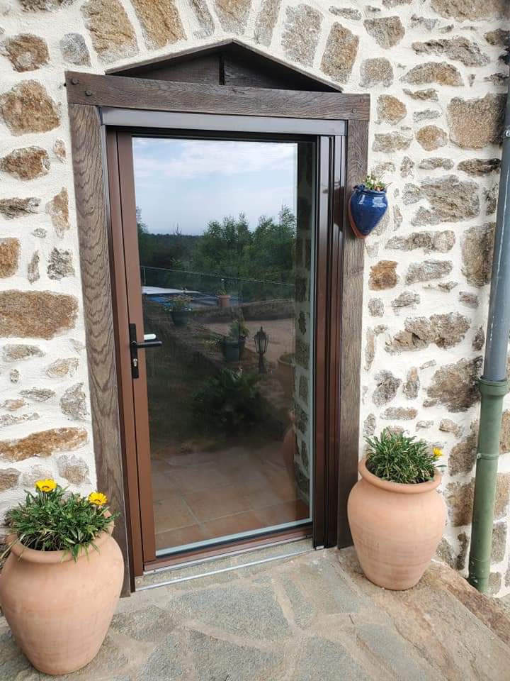 Porte de service vitrée