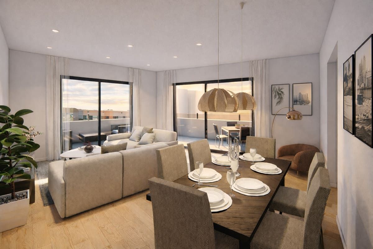 Sala de estar y comedor con muebles modernos, abierto a un balcón con vistas.