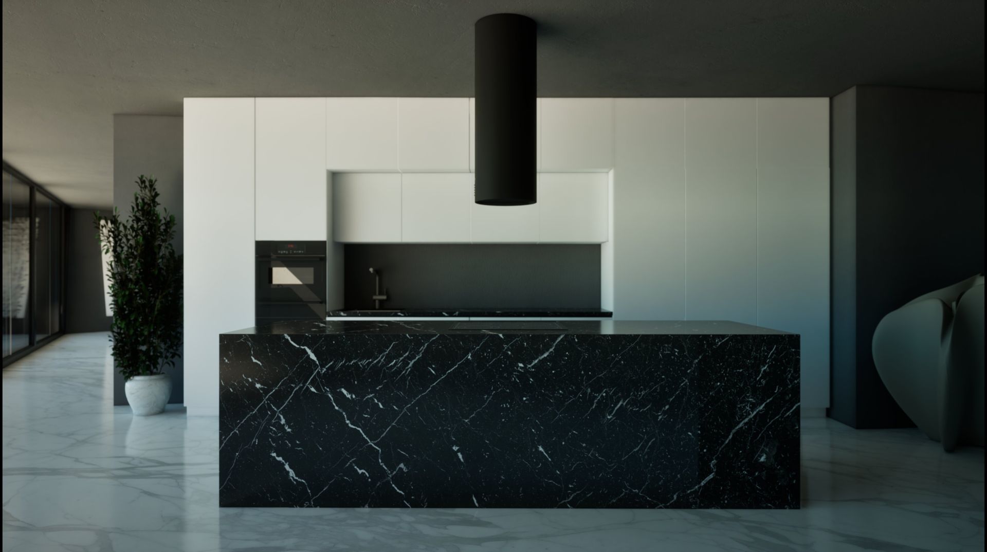 Una cocina con encimeras negras y gabinetes blancos.