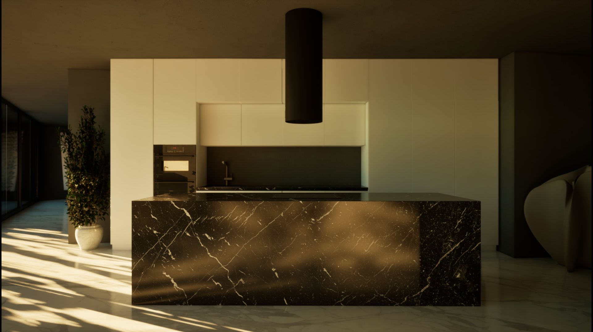 Una cocina con encimera negra y gabinetes blancos.