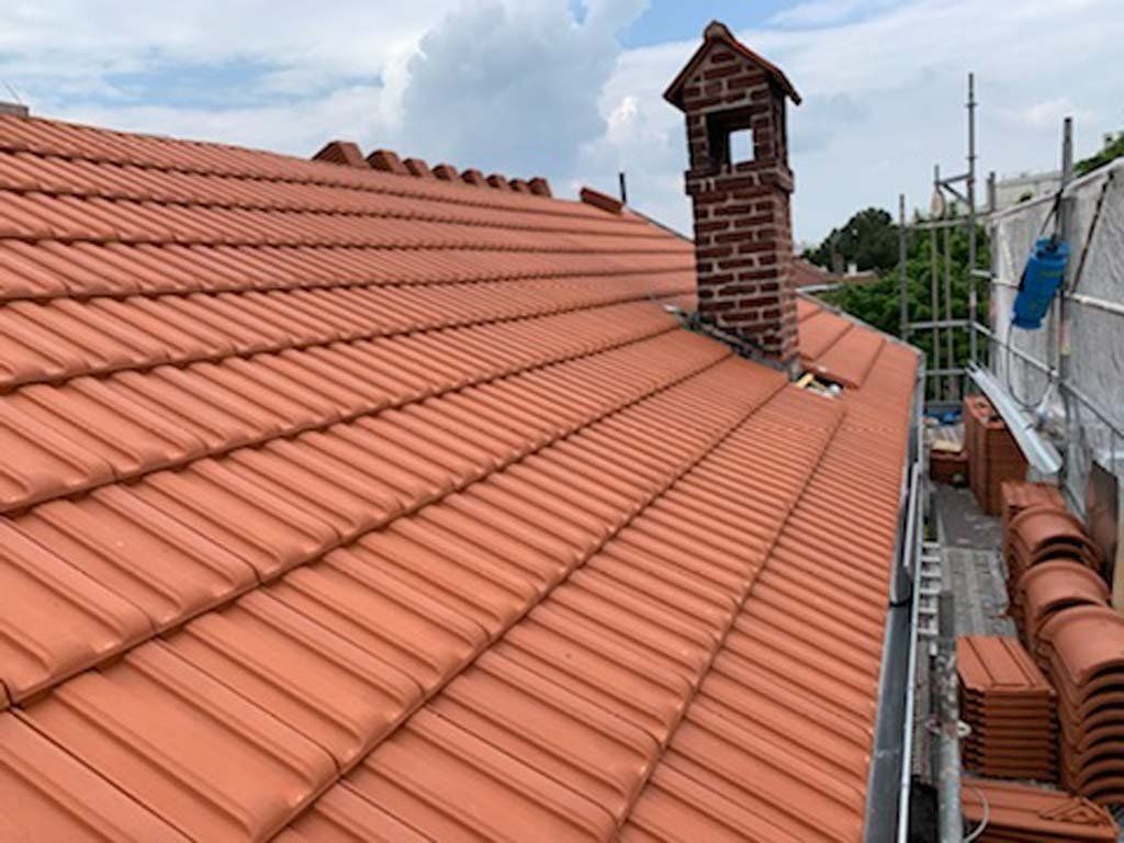 Maison avec tuiles neuves