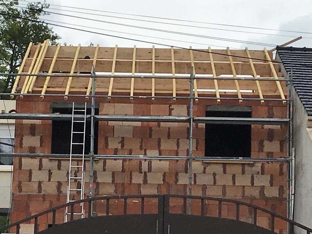 Travaux de charpente maison neuve