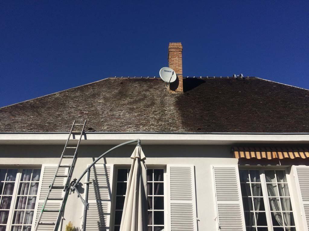 Travaux de nettoyage de toiture