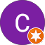Un círculo morado con una letra c blanca y una estrella naranja dentro.