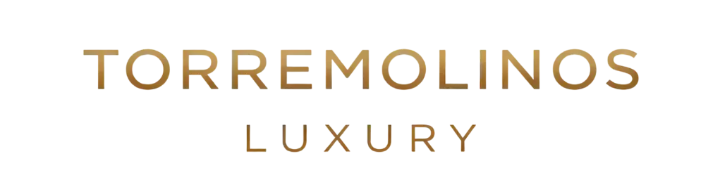 Torremolinos Luxury logo in gold on a white background.