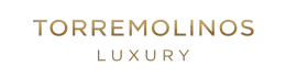 Torremolinos Luxury logo in gold on a white background.