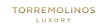 Torremolinos Luxury logo in gold on a white background.