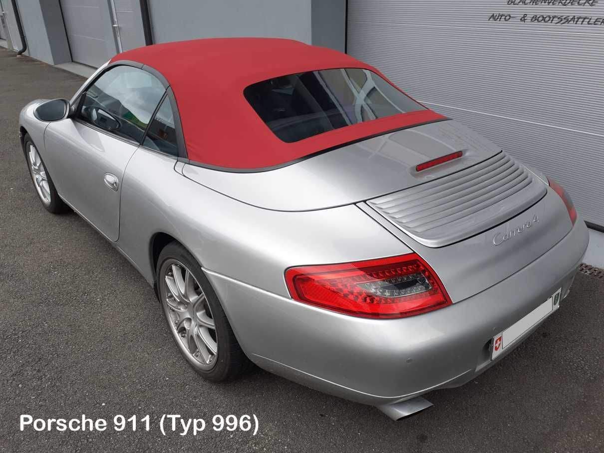 Silberner Porsche 911 Cabriolet mit rotem Verdeck
