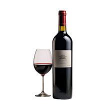 Uma garrafa de vinho tinto ao lado de uma taça de vinho tinto