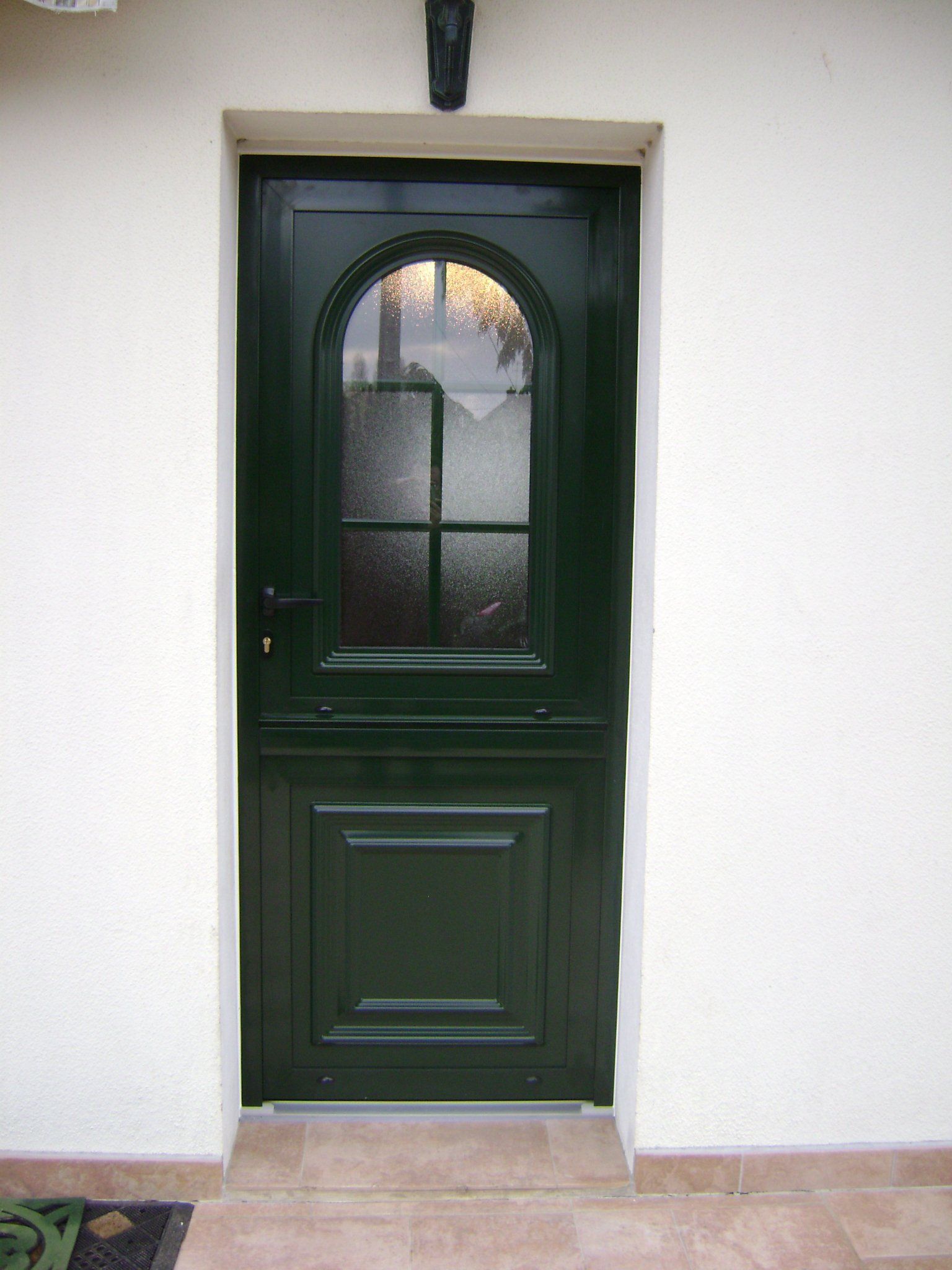 Porte vitrée et vert sapin