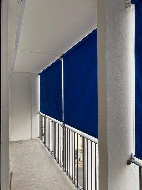 store verticaux motorisés