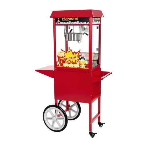 Machine à pop-corn rouge avec des roues pour la déplacer