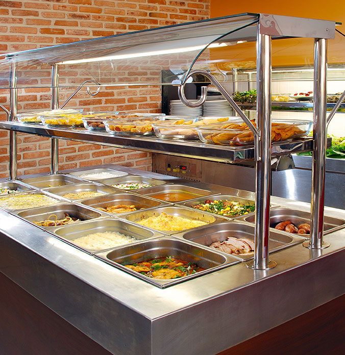 Meuble dédié au self service avec des bacs dédiésà la nourriture