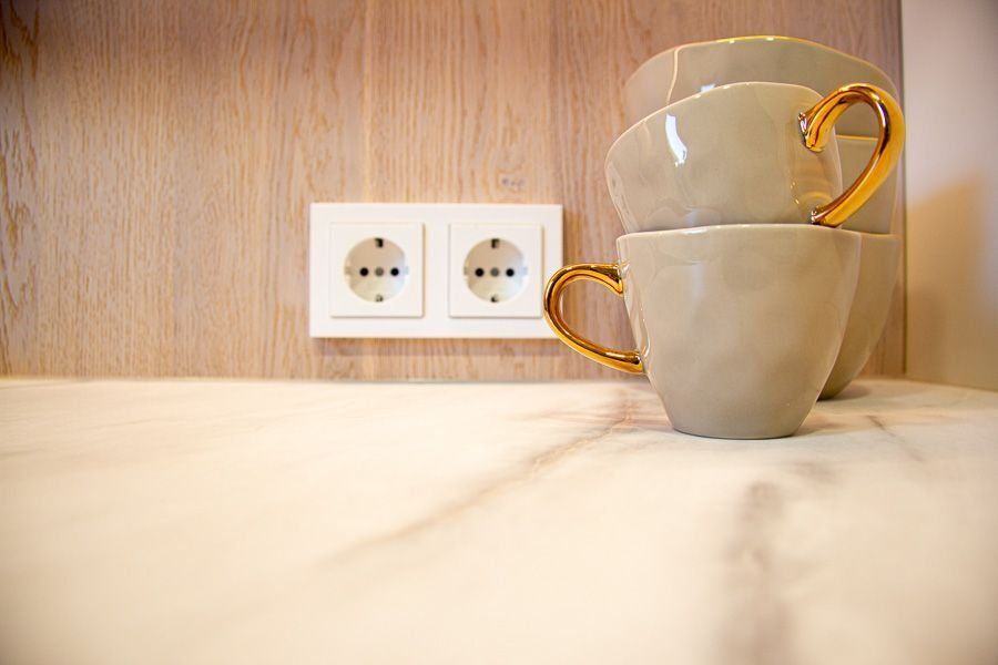 moderne Küche mit Fenix Front und Bora Kochfeld in Nürnberg