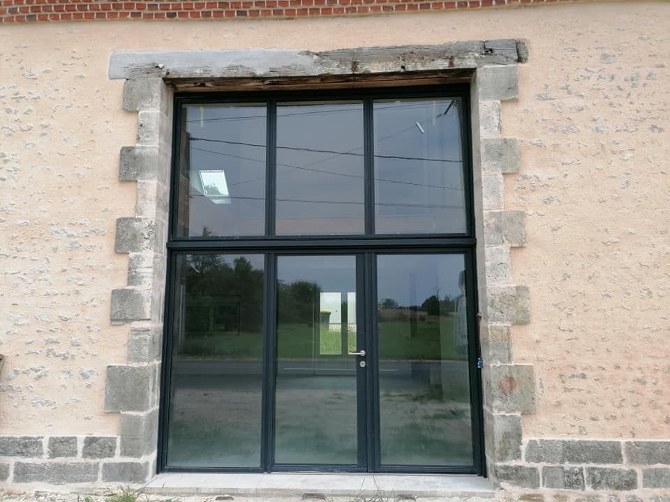 Baie vitrée style verrière