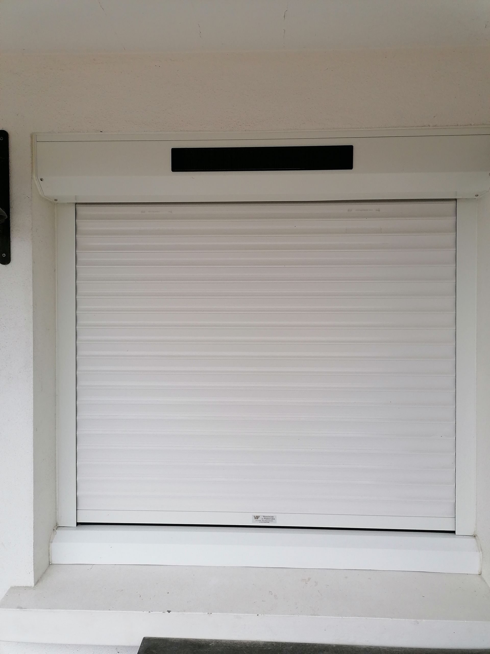Volets roulants blancs